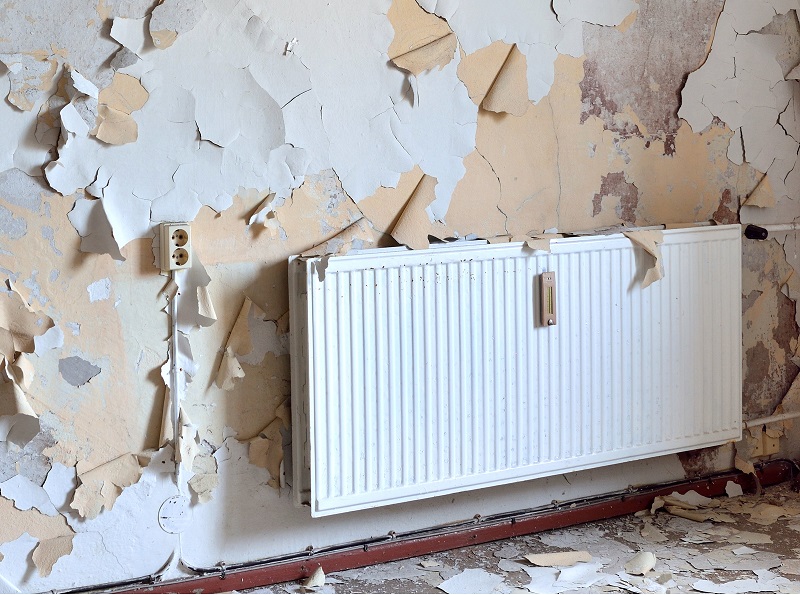 Cómo pintar una pared con un radiador de gas natural